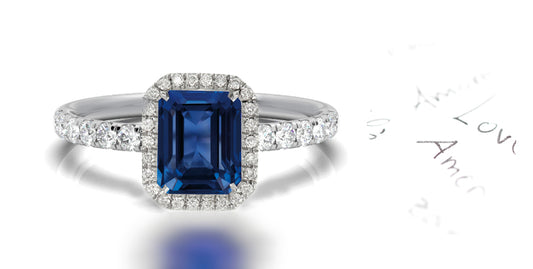 144 custom made unique emerald cut blue sapphire center stone and diamond halo engagement ring