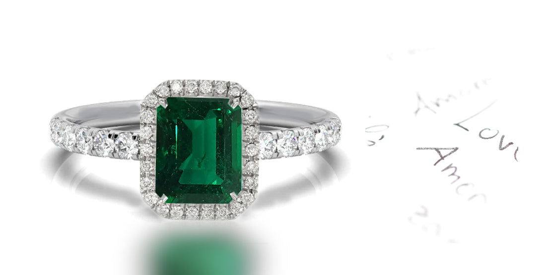 144 custom made unique emerald cut emerald center stone and diamond halo engagement ring