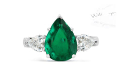 150 custom made unique pear emerald center stone and pear diamond accents three stone engagement ring