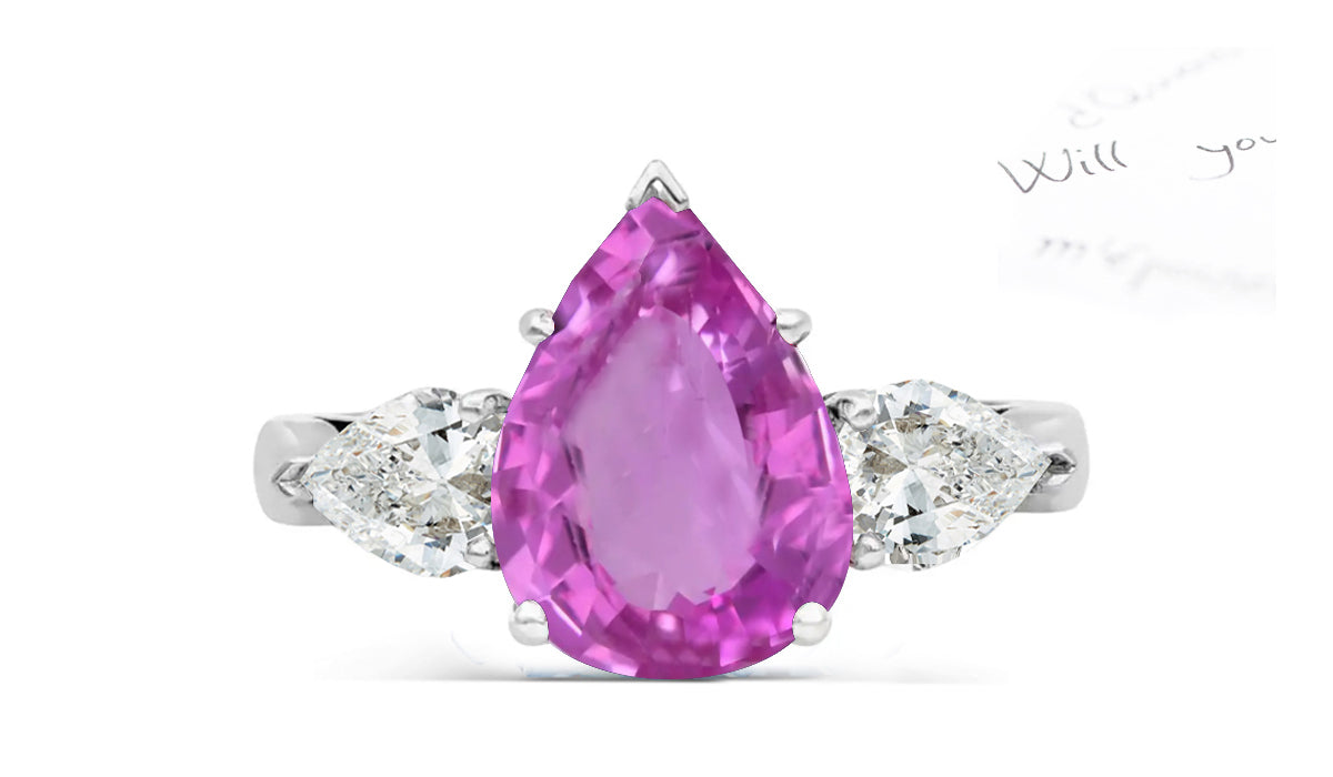 150 custom made unique pear pink sapphire center stone and pear diamond accents three stone engagement ring