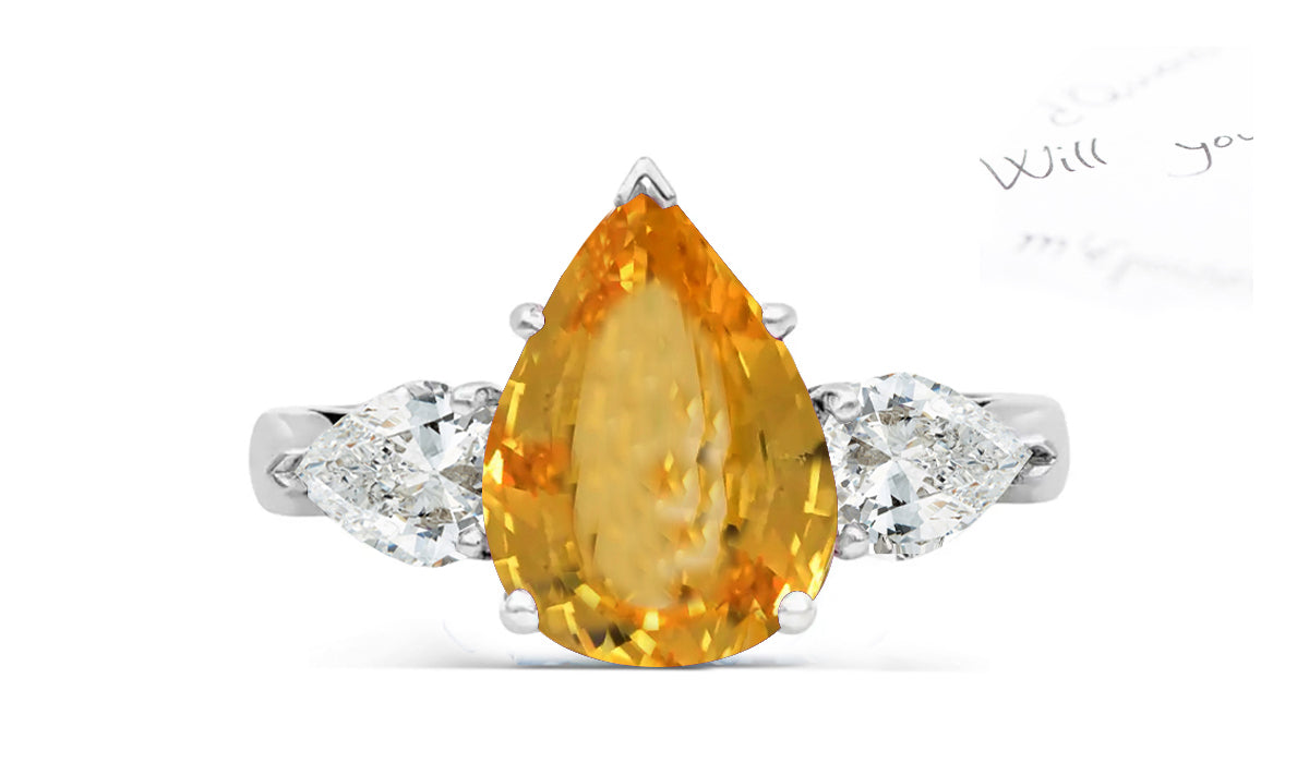 150 custom made unique pear yellow sapphire center stone and pear diamond accents three stone engagement ring