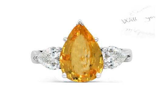 150 custom made unique pear yellow sapphire center stone and pear diamond accents three stone engagement ring