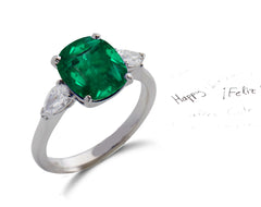 153 custom made unique cushion cut emerald center stone and pear diamond accents three stone engagement ring