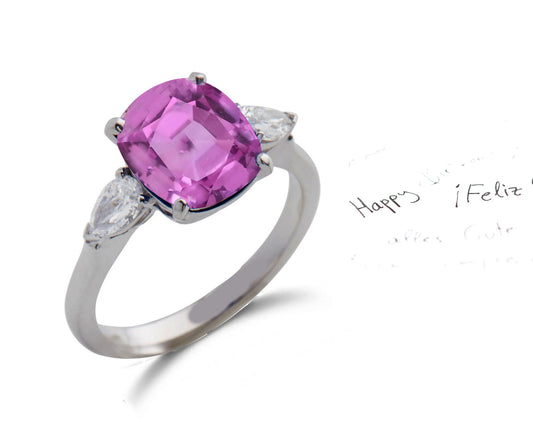 153 custom made unique cushion cut pink sapphire center stone and pear diamond accents three stone engagement ring