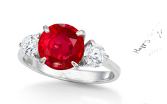 154 custom made unique round ruby center stone and round diamond accents three stone engagement ring