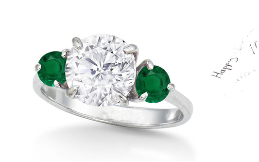 155 custom made unique round diamond center stone and emerald diamond accents three stone engagement ring