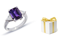 157 custom made unique emerald cut purple sapphire center stone and trillion cut diamond accents three stone engagement ring