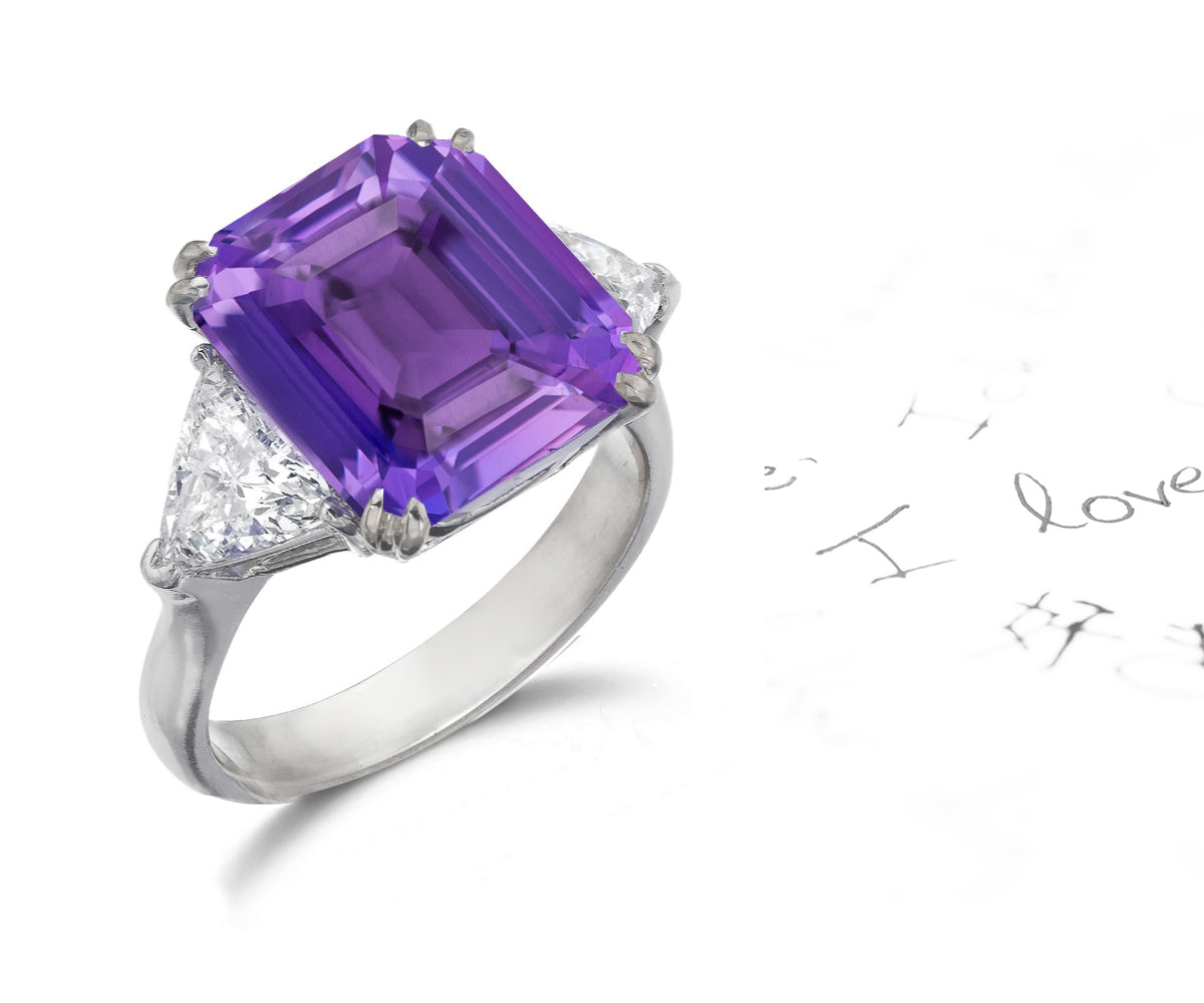 158 custom made unique emerald cut purple sapphire center stone and trillion cut diamond accents three stone engagement ring