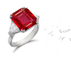 158 custom made unique emerald cut ruby center stone and trillion cut diamond accents three stone engagement ring