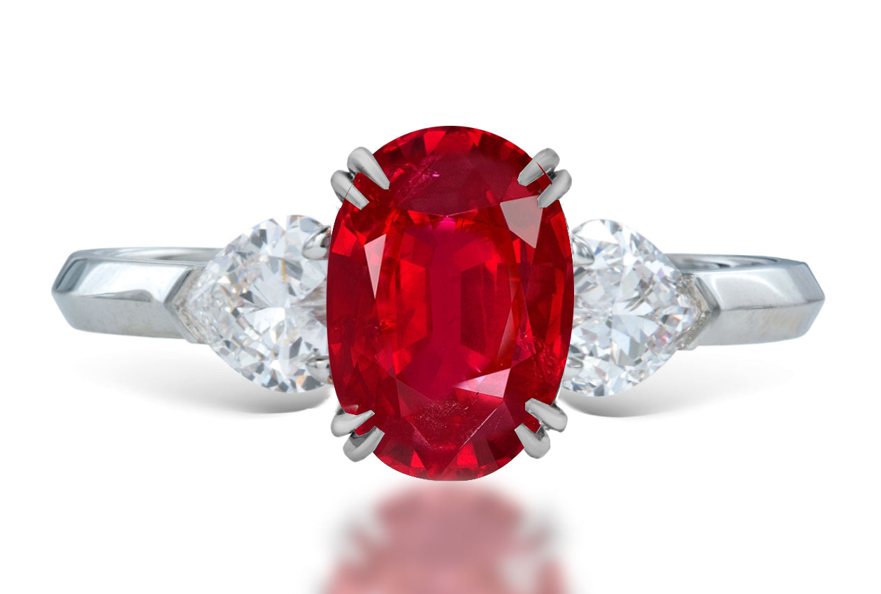 16 custom made unique oval ruby center stone with heart diamond accents three stone engagement ring