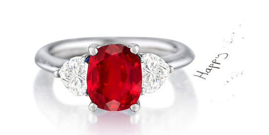 162 custom made unique oval ruby center stone and heart diamond accents three stone engagement ring