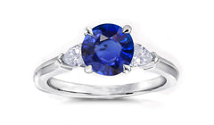 163 custom made unique round blue sapphire center stone and pear diamond accents three stone engagement ring