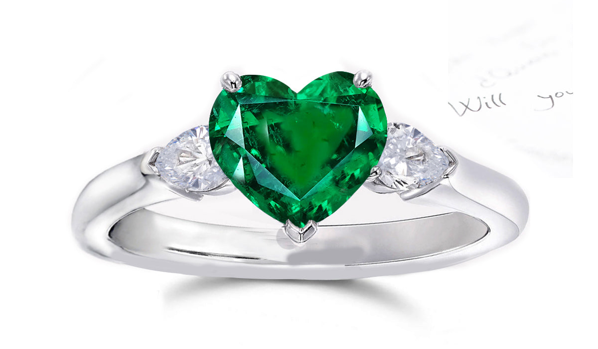 164 custom made unique heart emerald center stone and pear diamond accents three stone engagement ring