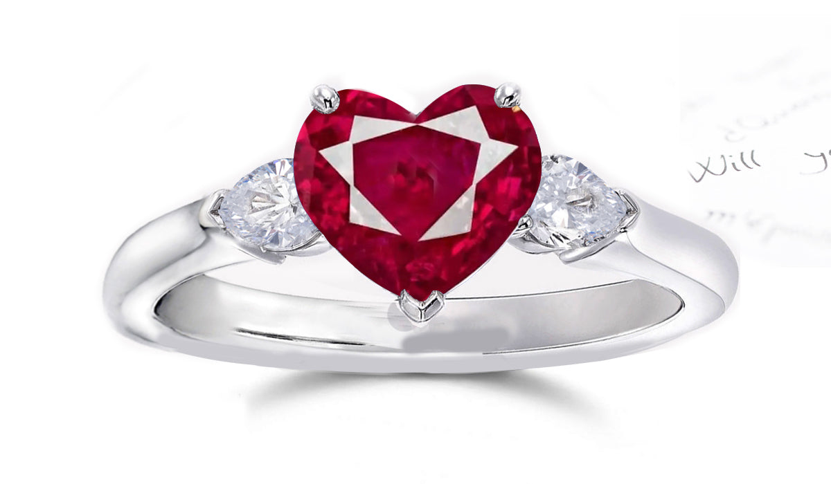 164 custom made unique heart ruby center stone and pear diamond accents three stone engagement ring