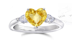 164 custom made unique heart yellow sapphire center stone and pear diamond accents three stone engagement ring