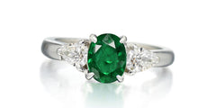 168 custom made unique oval emerald center stone and pear diamond accents three stone engagement ring