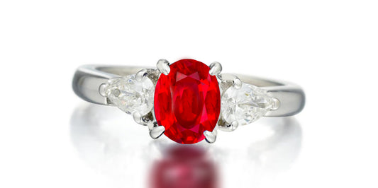 168 custom made unique oval ruby center stone and pear diamond accents three stone engagement ring