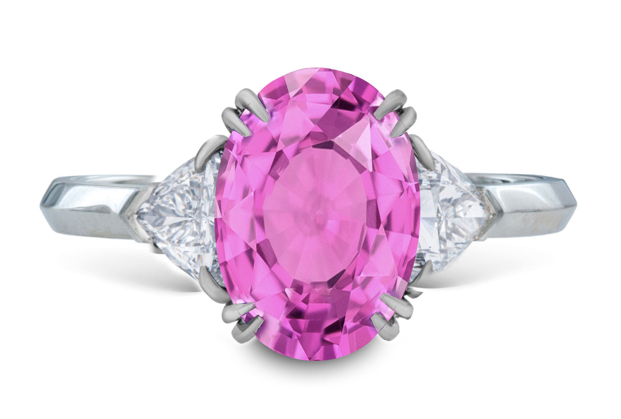 17 custom made unique oval pink sapphire center stone with trillion diamond accents three stone engagement ring