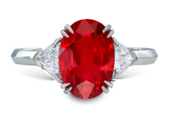 17 custom made unique oval ruby center stone with trillion diamond accents three stone engagement ring