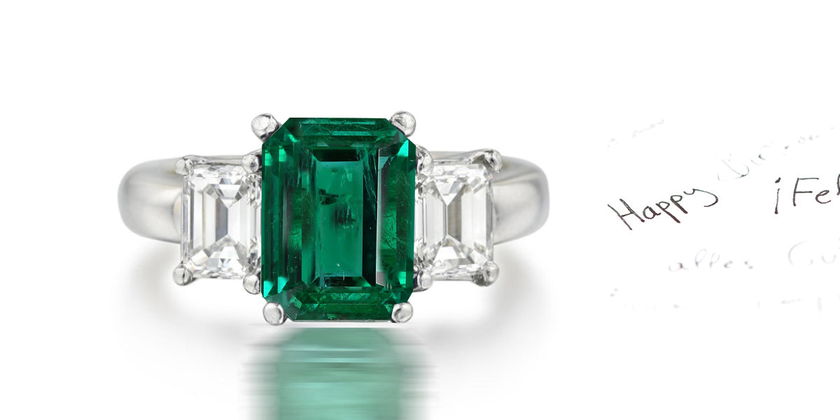 177 custom made unique emerald cut emerald center stone and emerald cut diamond accents three stone engagement ring