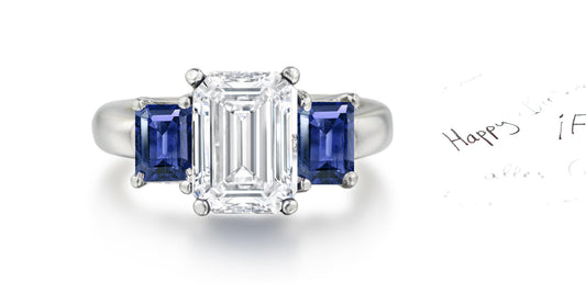 178 custom made unique emerald cut diamond center stone and emerald cut blue sapphire accents three stone engagement ring