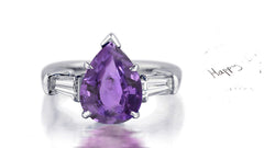 181 custom made unique pear cut purple sapphire center stone and baguette cut diamond accents three stone engagement ring