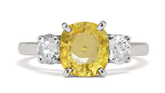 182 custom made unique oval yellow sapphire center stone and round diamond accents three stone engagement ring