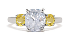 183 custom made unique oval diamond center stone and round yellow sapphire accents three stone engagement ring