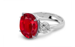 184 custom made unique oval ruby center stone and heart diamond accents three stone engagement ring