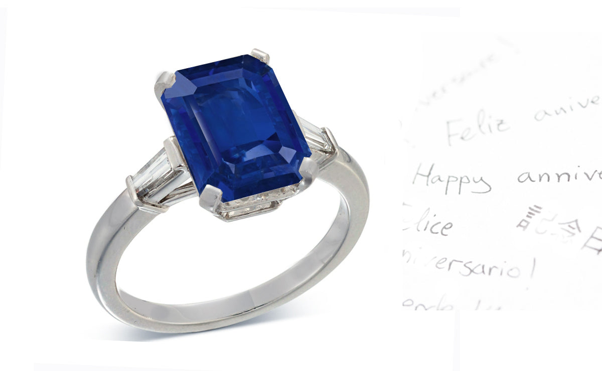 19 custom made unique emerald cut blue sapphire center stone with baguette diamond accents three stone engagement ring