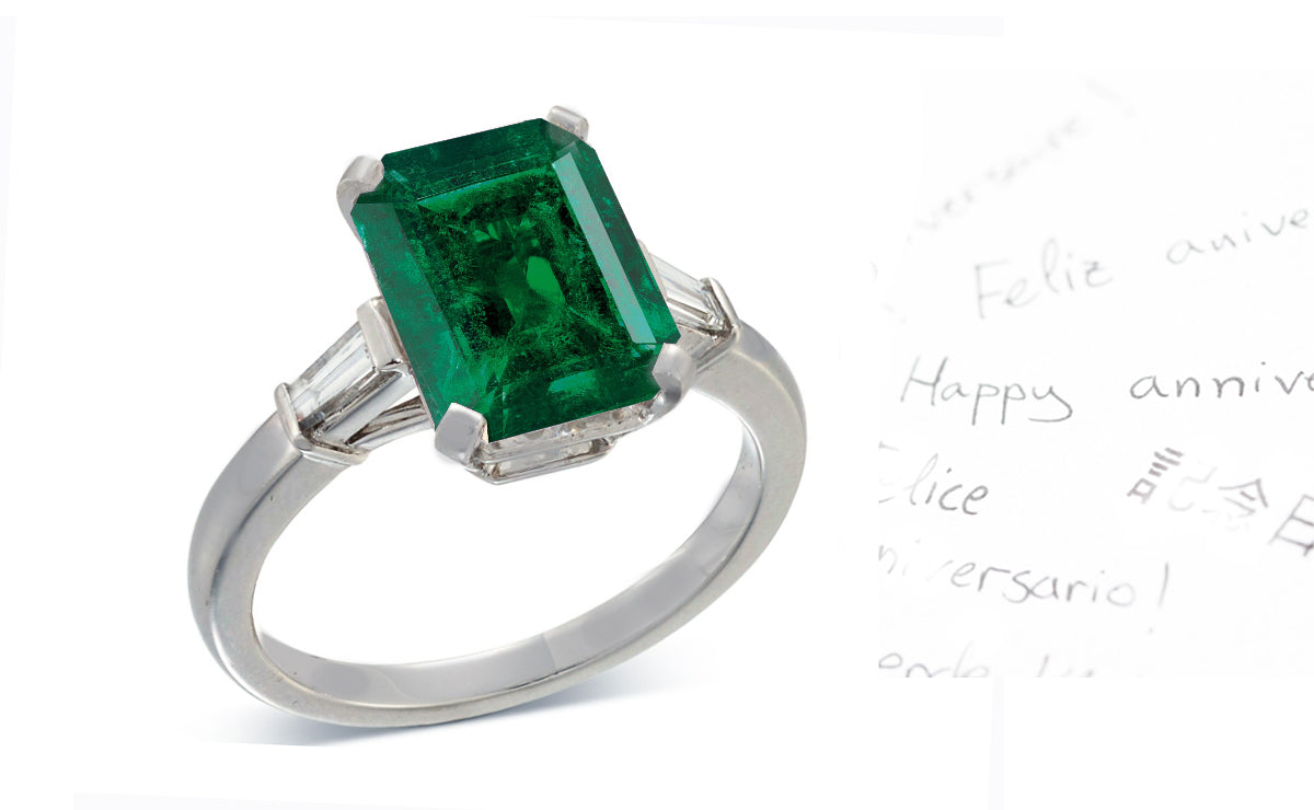 19 custom made unique emerald cut emerald center stone with baguette diamond accents three stone engagement ring