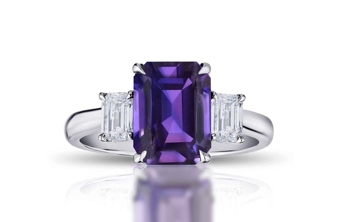 193 custom made unique emerald cut purple sapphire center stone and emerald cut diamond accents three stone engagement ring