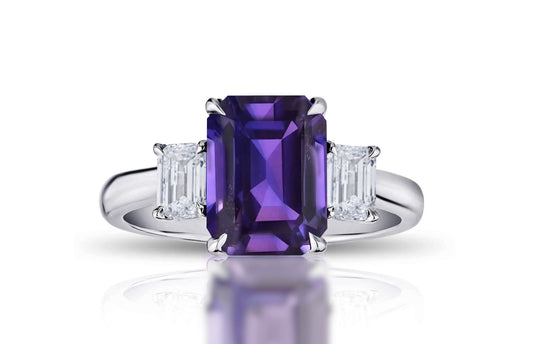 193 custom made unique emerald cut purple sapphire center stone and emerald cut diamond accents three stone engagement ring