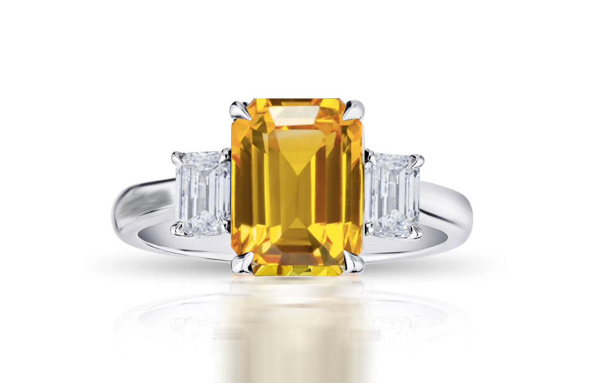 193 custom made unique emerald cut yellow sapphire center stone and emerald cut diamond accents three stone engagement ring