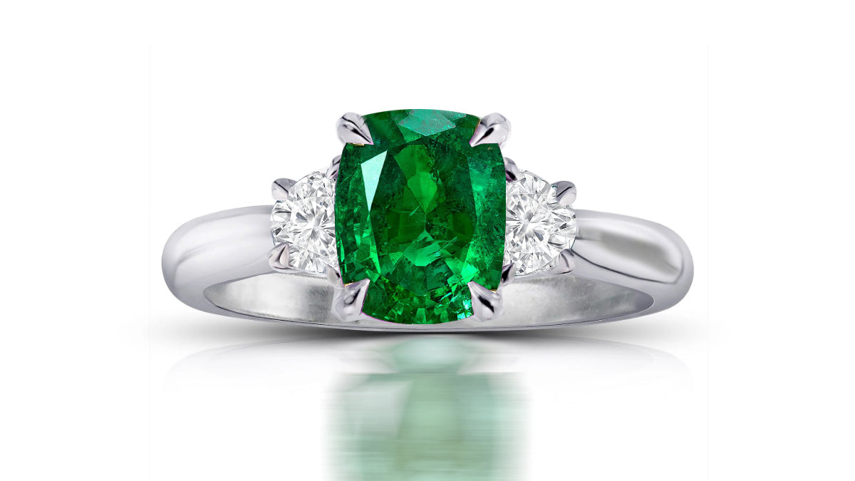 195 custom made unique oval emerald center stone and heart diamond accents three stone engagement ring