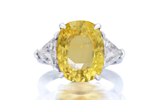 197 custom made unique oval yellow sapphire center stone and trillion cut diamond accents three stone engagement ring