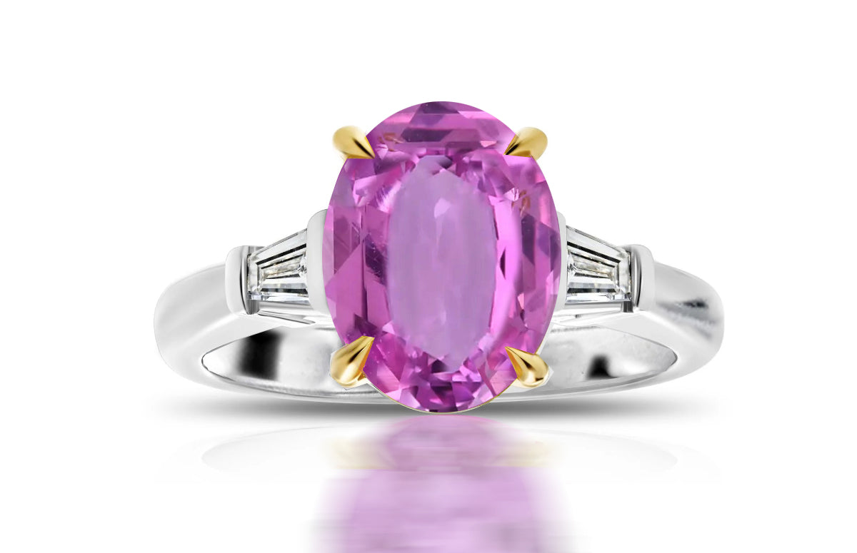 198 custom made unique oval pink sapphire center stone and baguette cut diamond accents three stone engagement ring