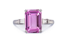 19 custom made unique emerald cut pink sapphire center stone with baguette diamond accents three stone engagement ring