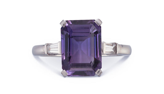 19 custom made unique emerald cut purple sapphire center stone with baguette diamond accents three stone engagement ring