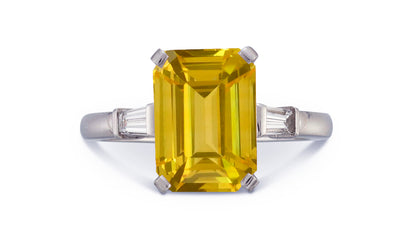 19 custom made unique emerald cut yellow sapphire center stone with baguette diamond accents three stone engagement ring