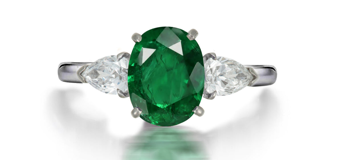 201 custom made unique oval emerald center stone and pear shaped diamond accents three stone engagement ring1