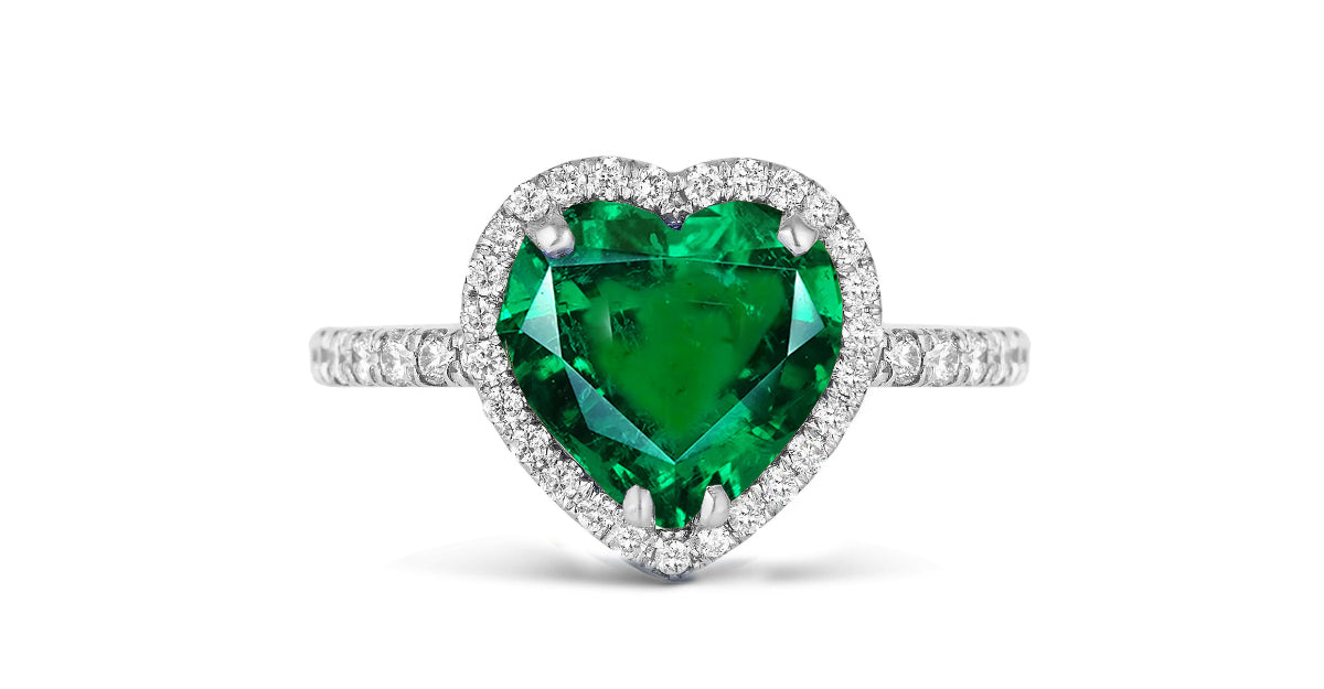 202 custom made unique heart emerald center stone and diamond halo engagement ring