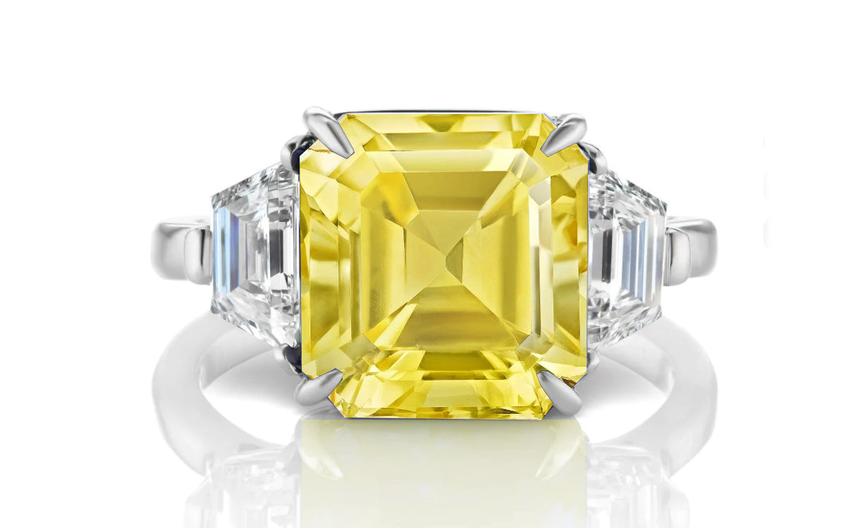 205 custom made unique assher cut yellow sapphire center stone and trapezoid diamond side three stone engagement ring