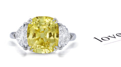 208 custom made unique cushion cut yellow sapphire center stone and heart diamond side three stone engagement ring