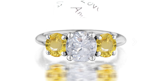 210 custom made unique round cut diamond center stone and round yellow sapphire side three stone engagement ring