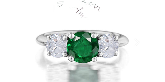 211 custom made unique round cut emerald center stone and round diamond side three stone engagement ring