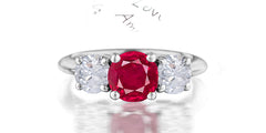 211 custom made unique round cut ruby center stone and round diamond side three stone engagement ring