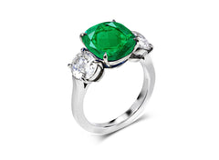 216 custom made unique cushion emerald center stone and oval diamond side three stone engagement ring