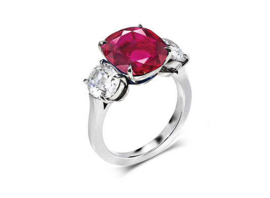 216 custom made unique cushion ruby center stone and oval diamond side three stone engagement ring