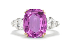 217 custom made unique oval pink sapphire center stone and pear diamond side three stone engagement ring